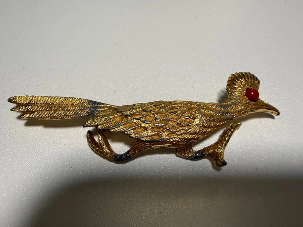 Vintage J. Ritter gold tone roadrunner brooch with red cabochon eye